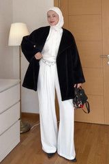 Şeyma Polat Damar'ın Tercihi Pileli Dökümlü Dokulu Pantolon